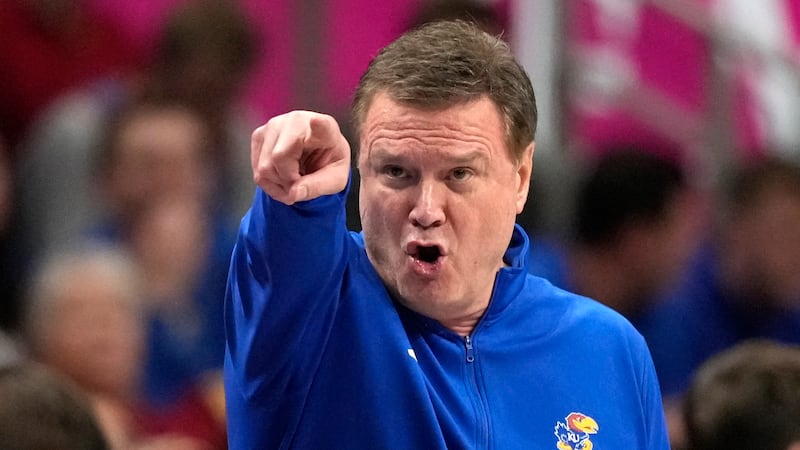 Kansas head coach Bill Self is seen on the sidelines during the first half of an NCAA college...