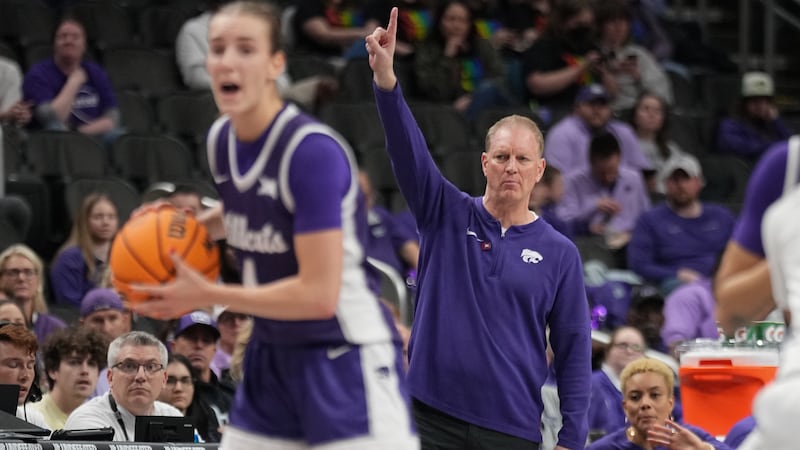 The K-State Wildcats and West Virginia Mountaineers compete during the Phillips 66 Big 12...