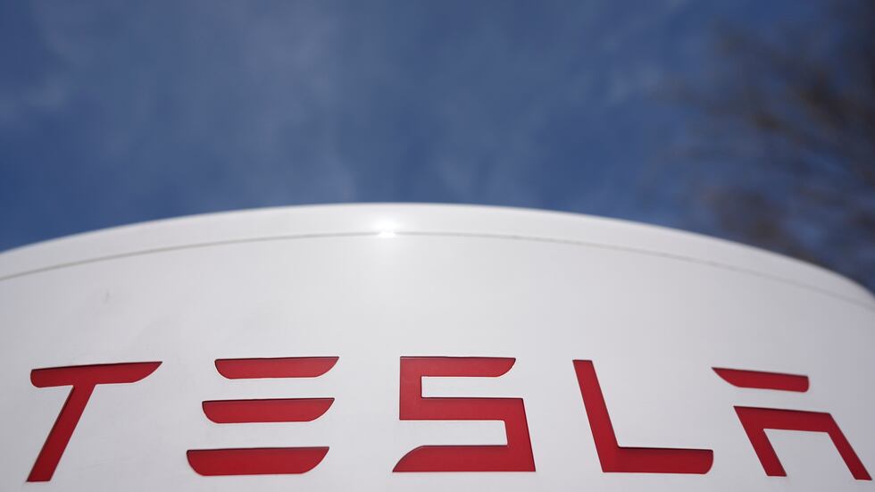 FILE - A Tesla level 3 charging station is seen on March 19, 2025, in Woodstock, Ga. (AP...