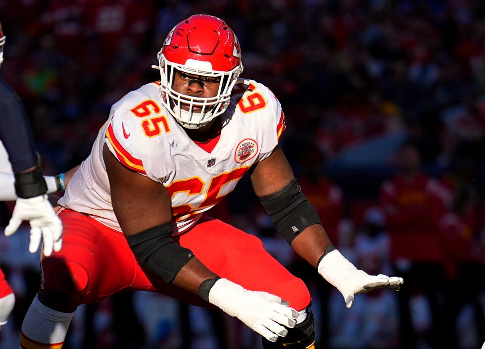 Kansas City Chiefs guard Trey Smith (65) plays against the Denver Broncos during the first...
